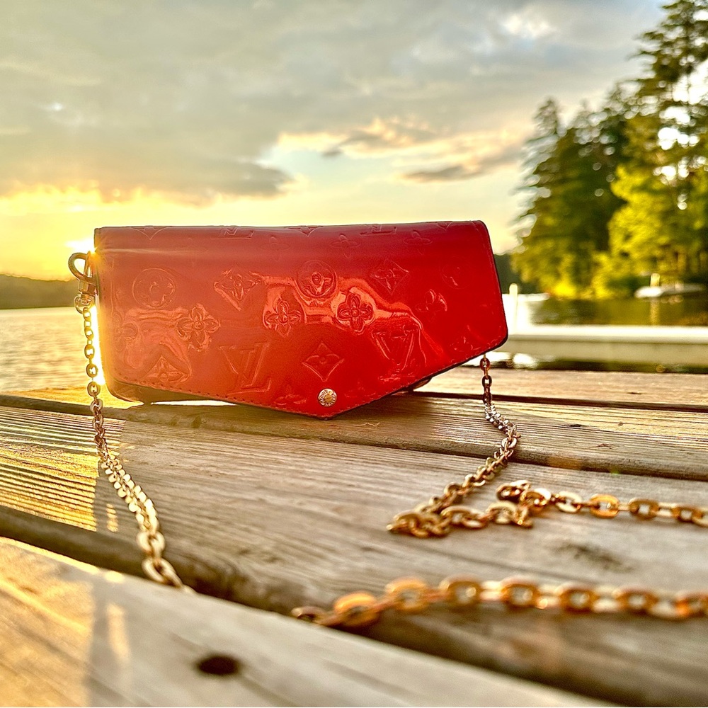 Red leather, Louis Vuitton over the shoulder bag.